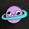 Pin esmaltado de planeta retrógrado