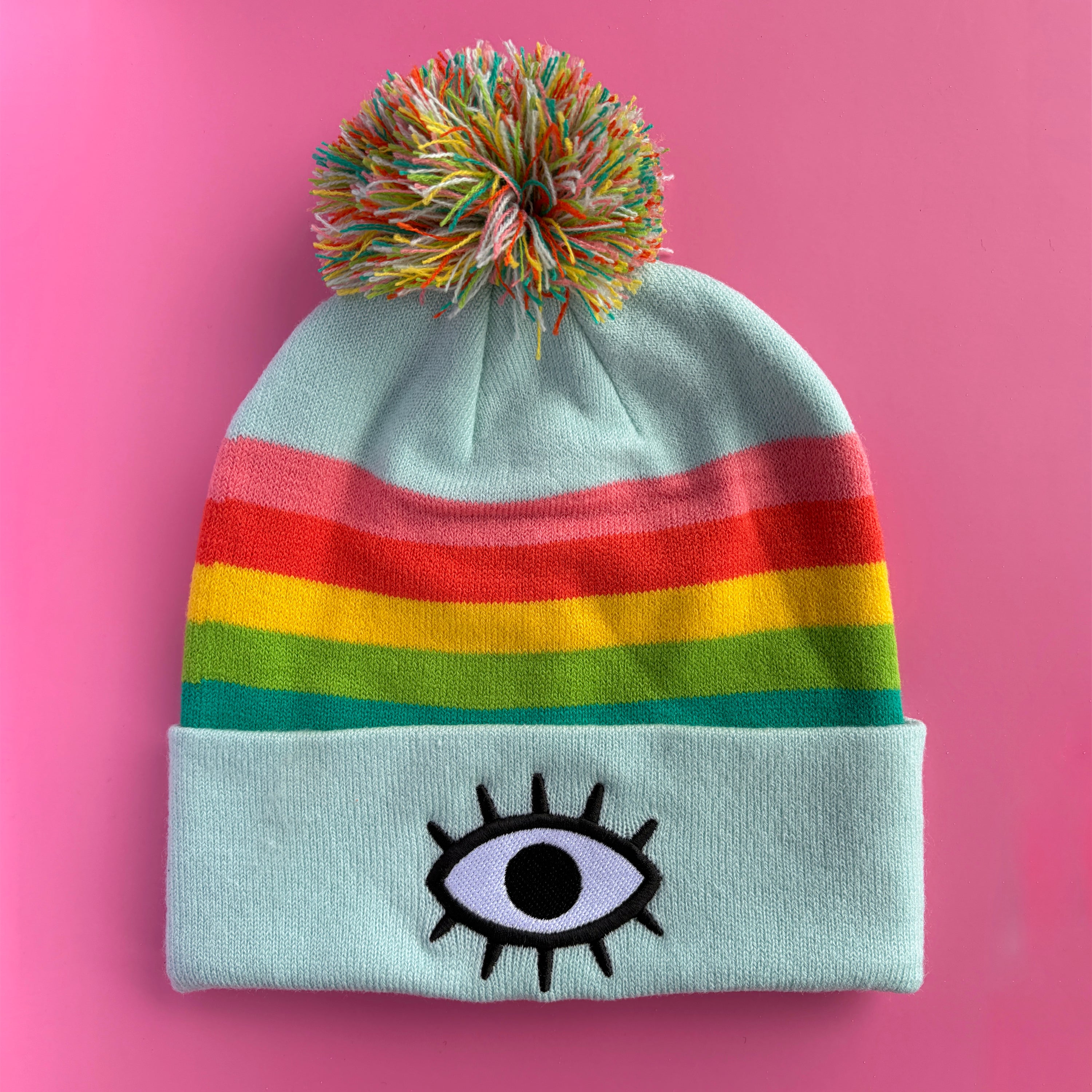 Gorro pompones de arcoíris azul