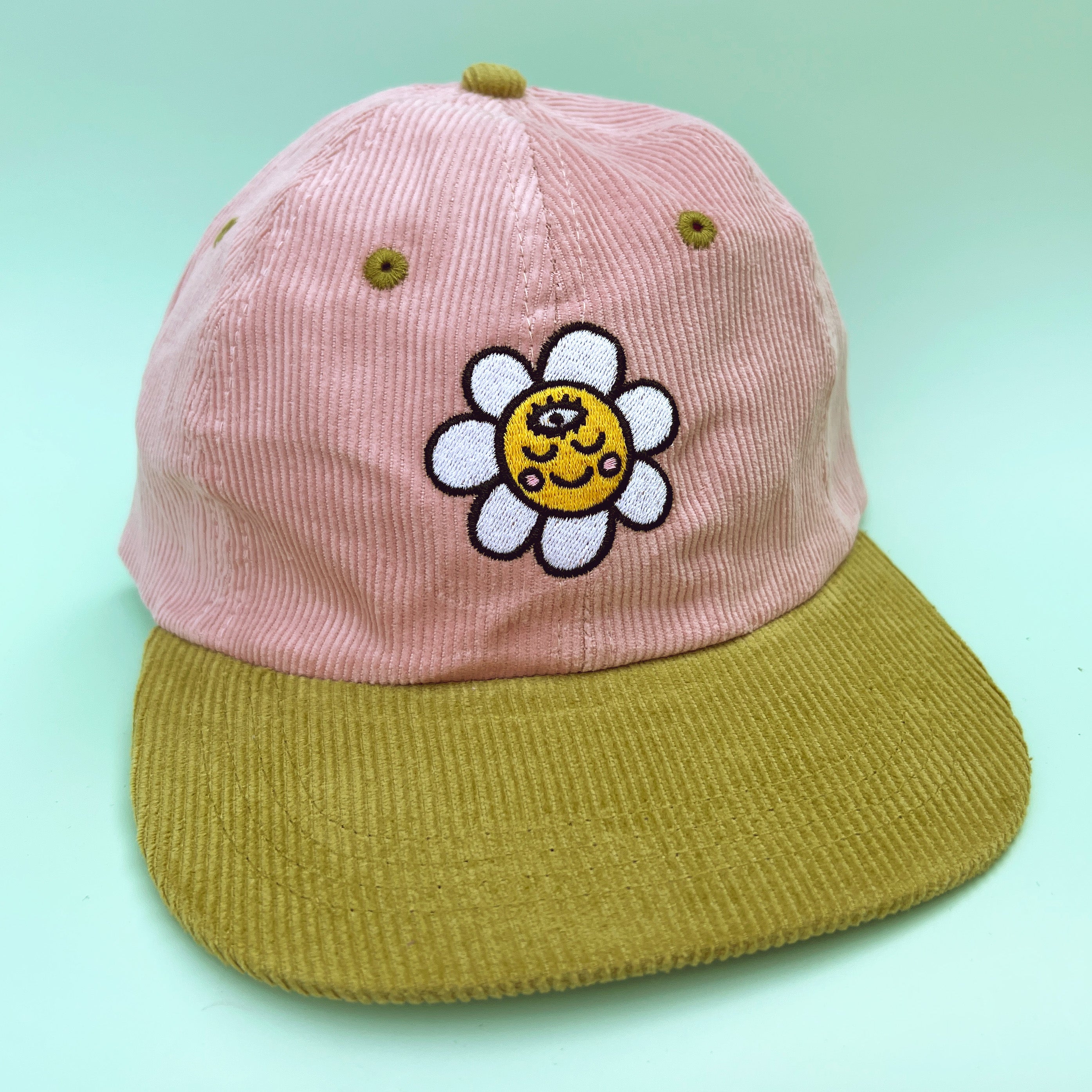 Gorro de pana con cara de margarita