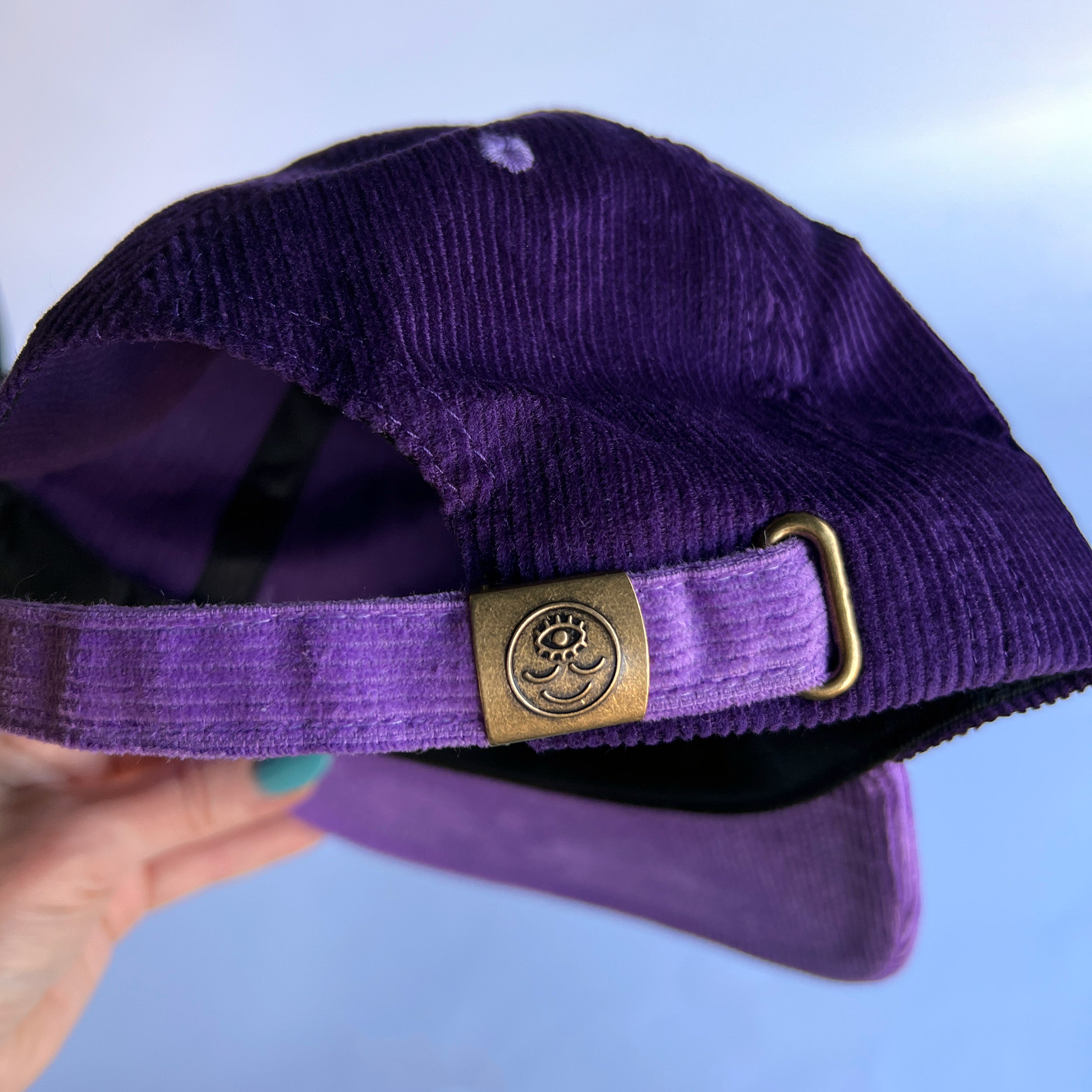 Gorra de pana con planeta retrógrado