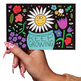 Postal de Sigue Cultivando Flores
